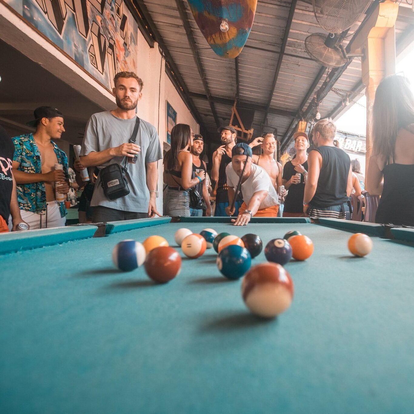 Pool table with people playing