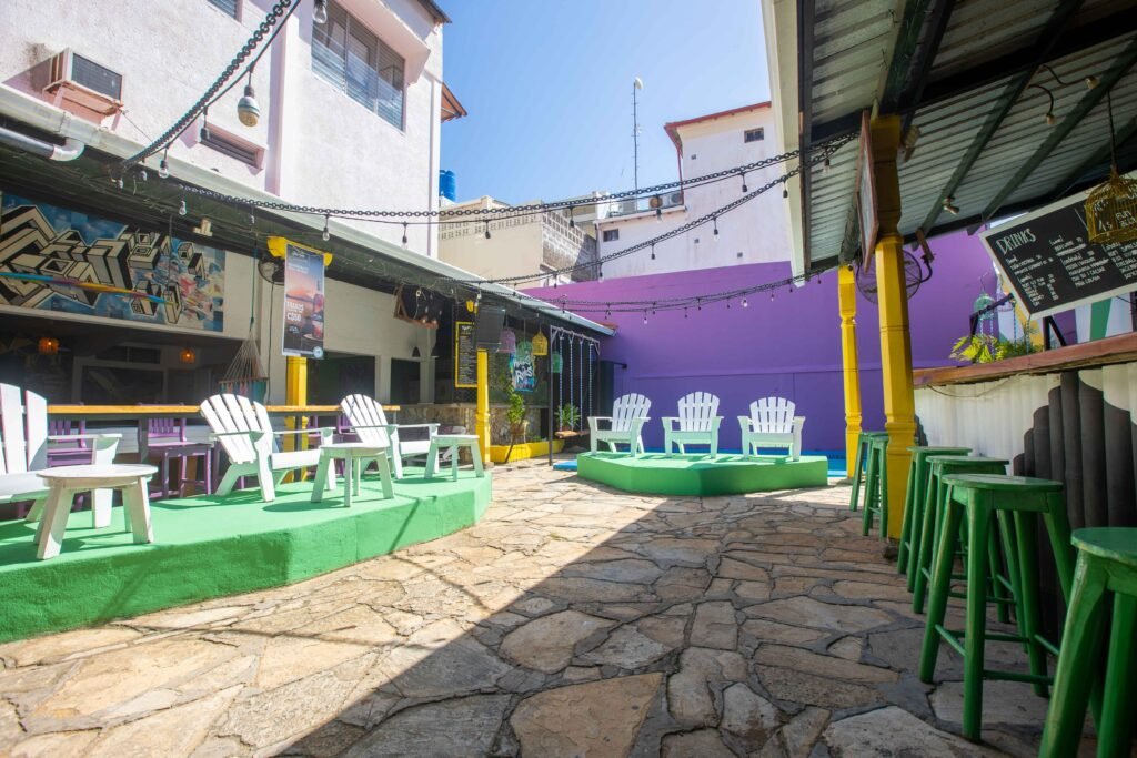 Pachamama Hostel outside area with sun loungers and pool