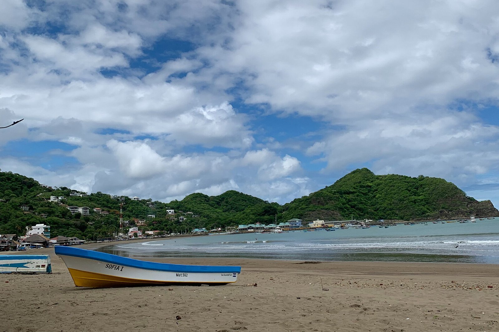 Little boat in the sand at beach